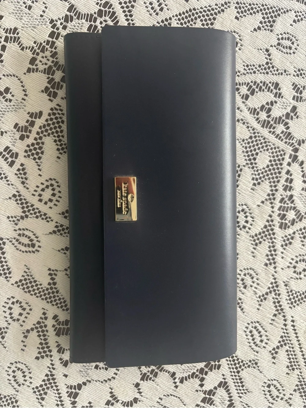 kate spade navy leather wallet with gold plaque